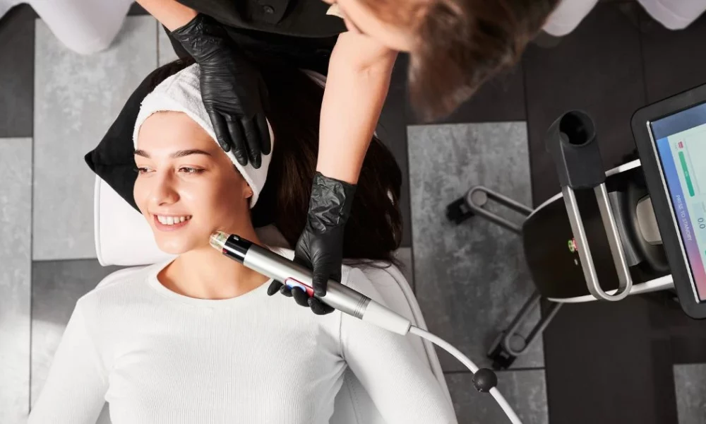 Woman with clear, radiant, and even skin tone, representing the goal of SkinPen Microneedling for hyperpigmentation treatment.